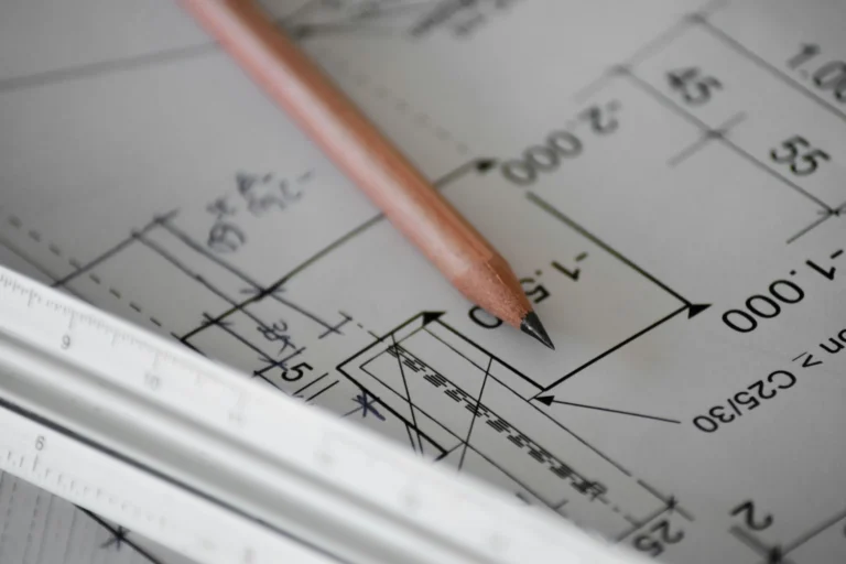 Engineering drawings with pencil on drafting paper