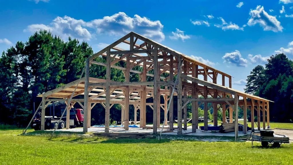 Post frame pole building with metal exterior siding