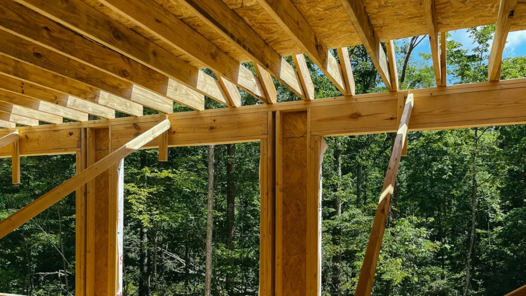 Wooden roof beam truss and joist framing system